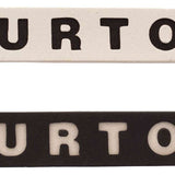 Burton Foam Mat Snowboard Stomp Pad - A rectangular foam mat with rounded corners, featuring the word "BURTON" in bold black letters across its top surface.