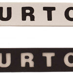 Burton Foam Mat Stomp Pad 2024 - A rectangular foam mat with rounded corners, featuring a solid light gray color and the word "BURTON" in large dark gray letters across its top surface.