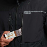 Burton Frostner 2L Jacket 2024 - A black jacket with a reflective stripe on the chest and a zippered pocket on the left side.