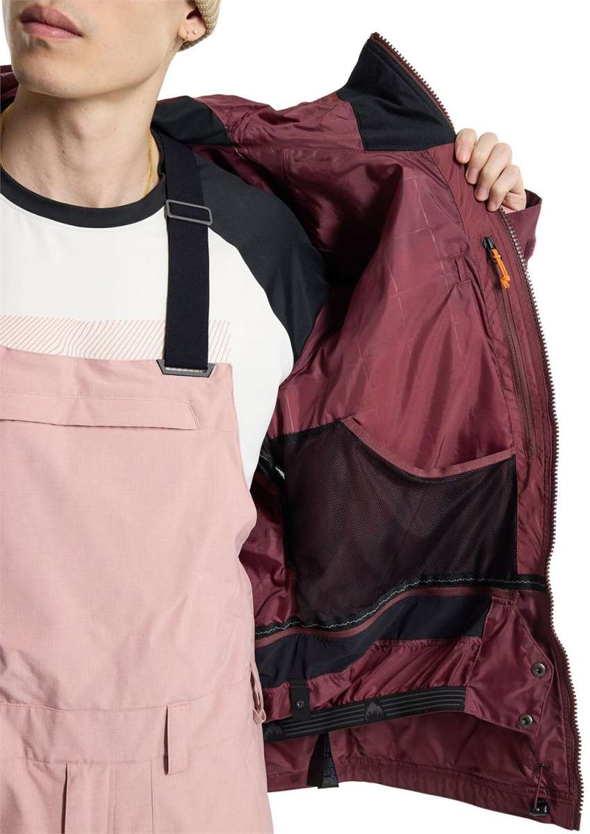 Burton Frostner 2L Jacket 2024 - A maroon jacket with a black zipper and two zippered pockets on the front.