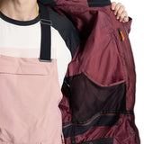 Burton Frostner 2L Jacket 2024 - A maroon jacket with a black zipper and two zippered pockets on the front.
