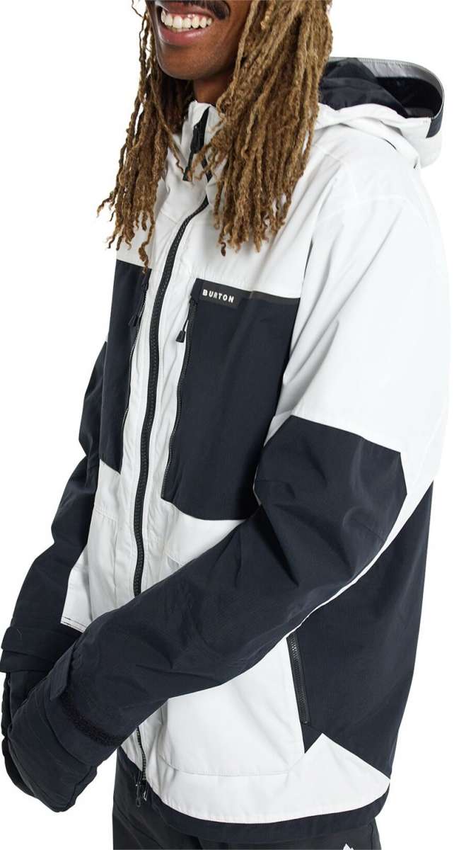 Burton Frostner 2L Jacket 2024 - A black and white jacket with a zippered chest pocket featuring the word "BURTON" in white letters.