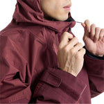 Burton Frostner 2L Jacket 2024 - A maroon jacket with a black zipper and two zippered pockets on the front.