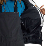 Burton Frostner 2L Jacket 2024 - A black jacket with a white stripe on the left sleeve and a zipper closure.