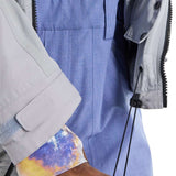 Burton Frostner 2L Jacket 2024 - A light blue jacket with a subtle grid pattern and black zipper.