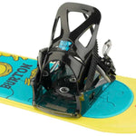 Burton Junior's Grom Disc Snowboard Binding 2024 - A black binding with a blue logo on top, mounted on a yellow snowboard.