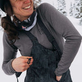 Burton Women's AK Gore-Tex Kimmy Bib Pant 2023 - Black bib with white dots and adjustable black buckles on straps.