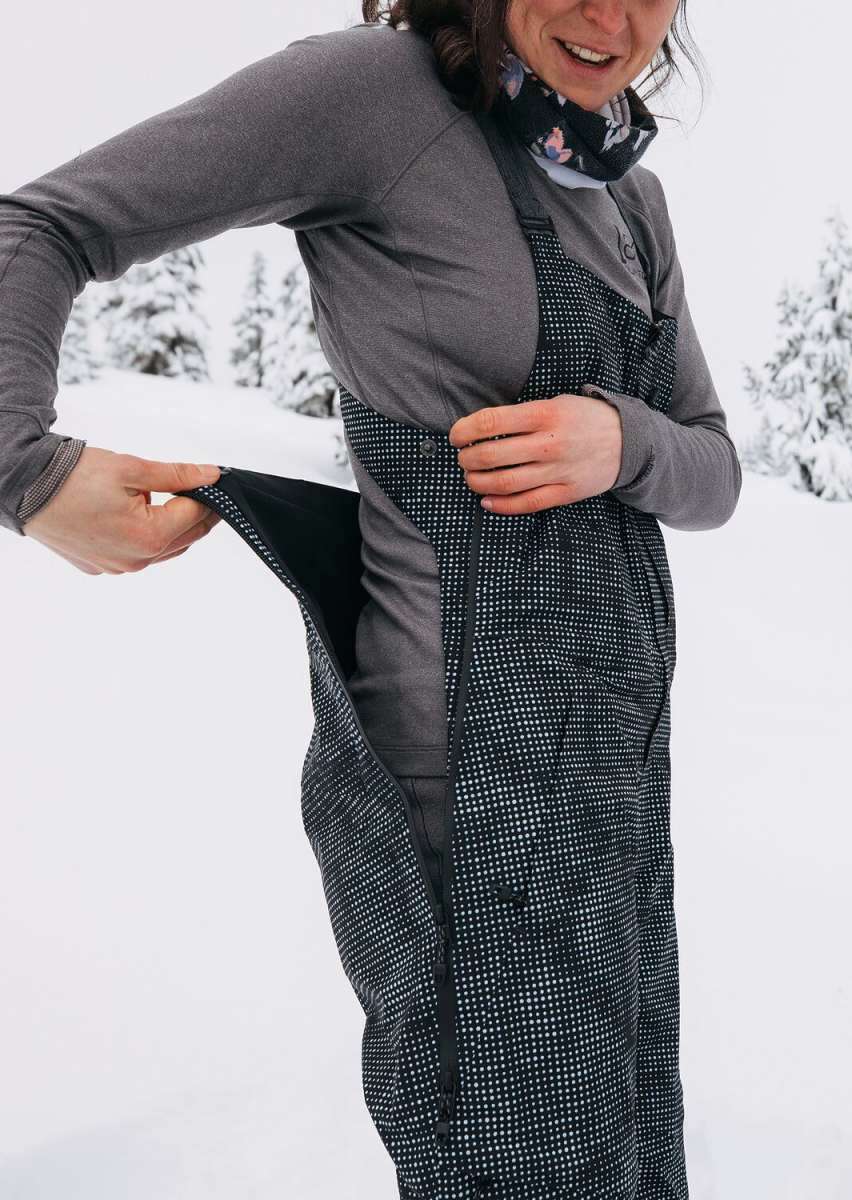 Burton Women's AK Gore-Tex Kimmy Bib Pant 2023 - Black bib with white dots and a black strap over the shoulder.