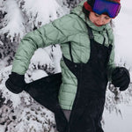 Burton Women's AK Gore-Tex Kimmy Bib Pant 2023 - Black bib pants with a quilted pattern on the upper thigh area.