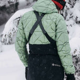 Burton Women's AK Gore-Tex Kimmy Bib Pant 2023 - Black bib pant with white logo on left leg and adjustable straps over shoulders.