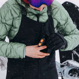 Burton Women's AK Gore-Tex Kimmy Bib Pant 2023 - Black bib pants with a white logo on the left leg and black straps over the shoulders.