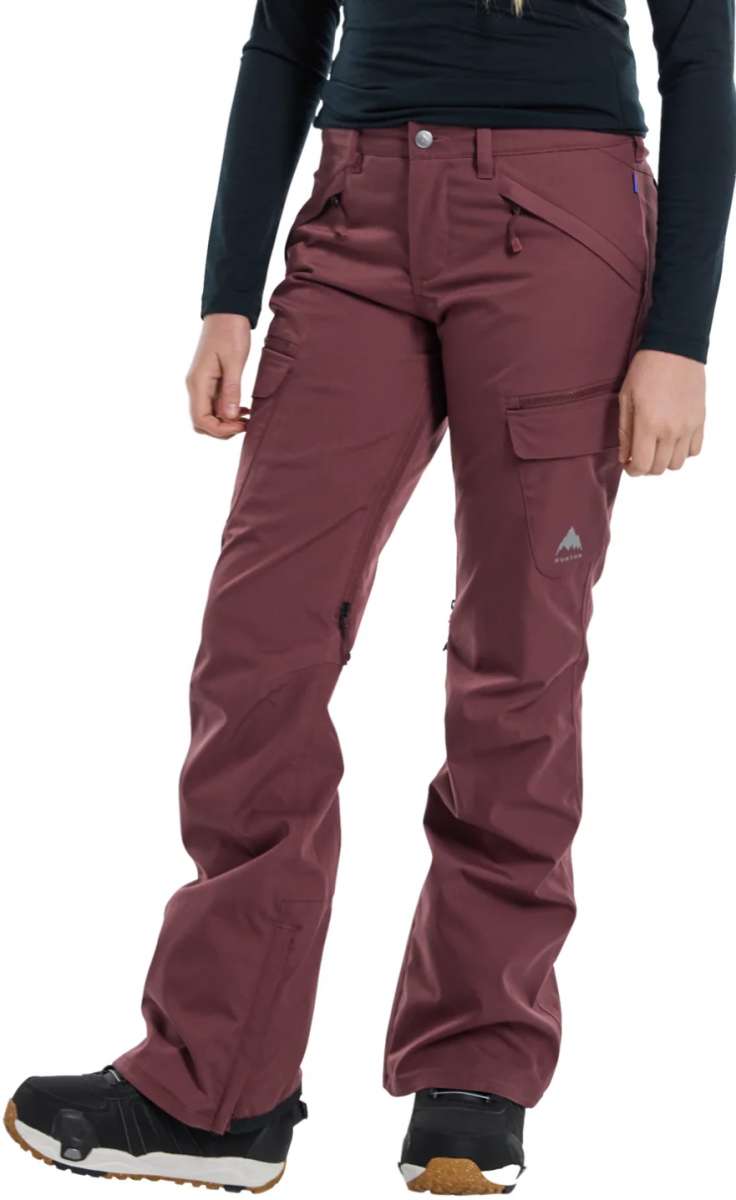 Burton Women's Gloria 2 Layer Stretch Pant 2024 - A pair of burgundy snow pants with a small zippered pocket on the right thigh and a white logo on the left leg.