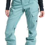 Burton Women's Gloria 2 Layer Stretch Pant 2024 - A pair of light blue snow pants with a zippered pocket on the thigh and adjustable Velcro straps at the waist.