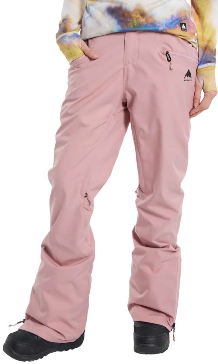 Burton Women's Marcy High Rise Stretch Pants 2024 - A pair of high-rise, pink snow pants with a black logo on the upper right thigh and a small zipper pocket above it.