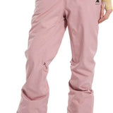 Burton Women's Marcy High Rise Stretch Pants 2024 - A pair of high-rise, pink snow pants with a black logo on the upper right thigh and a small zipper pocket above it.