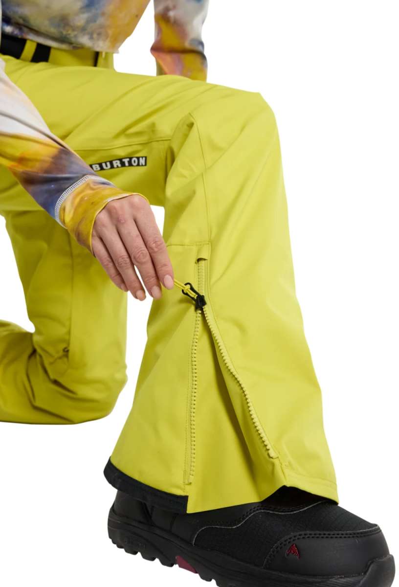 Burton Women's Marcy High Rise Stretch Pants 2024 - A pair of high-rise snow pants with a stretchy material and a zippered pocket on the side.