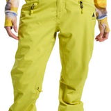 Burton Women's Marcy High Rise Stretch Pants 2024 - A pair of high-rise snow pants in a light green color with black accents and zippers on the side pockets.