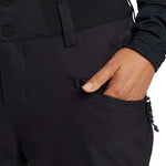 Burton Women's Marcy High Rise Stretch Pants 2024 - Black pants with a high rise waistband and stretch material.