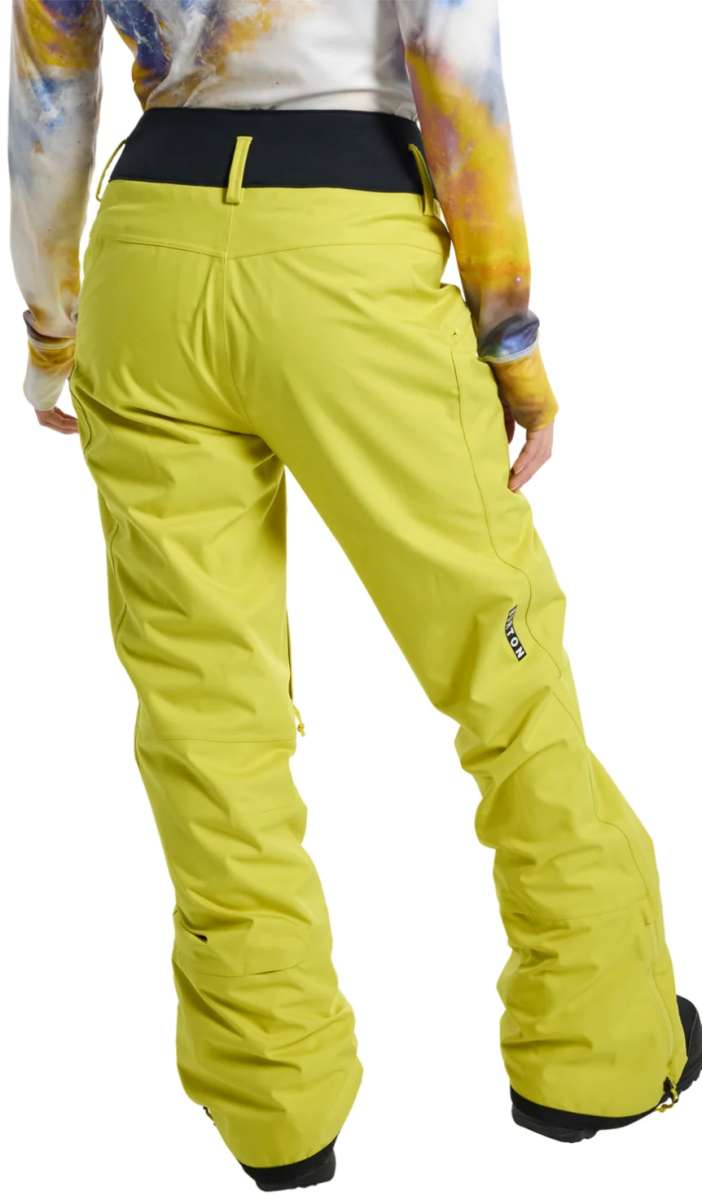 Burton Women's Marcy High Rise Stretch Pants 2024 - A pair of high-rise snow pants with a black waistband and zippered pockets.