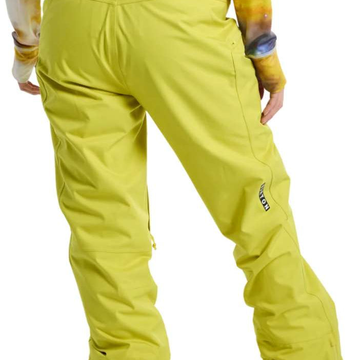 Burton Women's Marcy High Rise Stretch Pants 2024 - A pair of high-rise snow pants with a black waistband and zippered pockets.