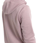 Burton Women's Oak Pullover Hoodie - A woman with dark hair and tan skin wearing a dusty rose hoodie, facing left.
