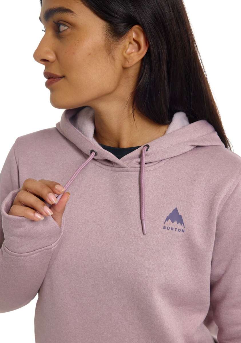 Burton Women's Oak Pullover Hoodie - A dusty rose-colored hoodie with a small, dark gray logo on the left chest featuring a mountain peak and the word "BURTON" in lowercase letters below it.