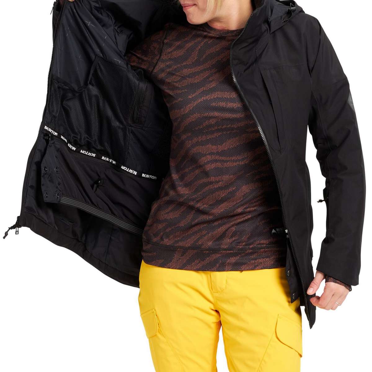 Burton Women's Pillowline GORE-TEX Insulated Jacket 2024 - A black jacket with a subtle pattern of thin, darker lines and a zippered chest pocket.