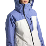 Burton Women's Pillowline GORE-TEX Insulated Jacket 2024 - A blue and white jacket with a black zipper on a model wearing it from chest up.