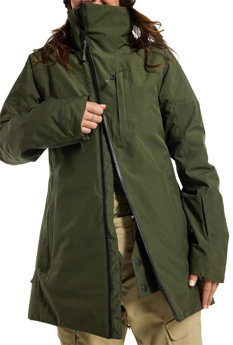 Burton Women's Pillowline GORE-TEX Insulated Jacket 2024 - A dark green jacket with a high collar and zippered pockets.