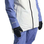 Burton Women's Pillowline GORE-TEX Insulated Jacket 2024 - A blue and white jacket with a hood, zipper closure, and two zippered pockets on the front.