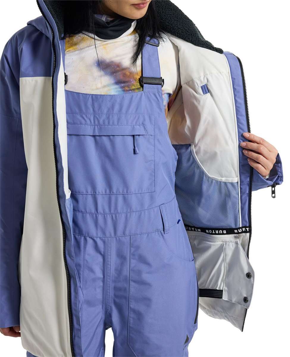 Burton Women's Pillowline GORE-TEX Insulated Jacket 2024 - A blue and white jacket with a black zipper on the chest, featuring a hood and adjustable cuffs.