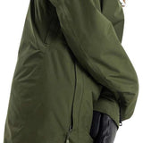 Burton Women's Pillowline GORE-TEX Insulated Jacket 2024 - A dark green jacket with a hood, featuring two zippered pockets on the front and a zipper down the middle.