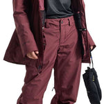 Burton Women's Pillowline GORE-TEX Insulated Jacket - A black jacket with a white logo on the left chest and a hood, featuring a zipper closure.