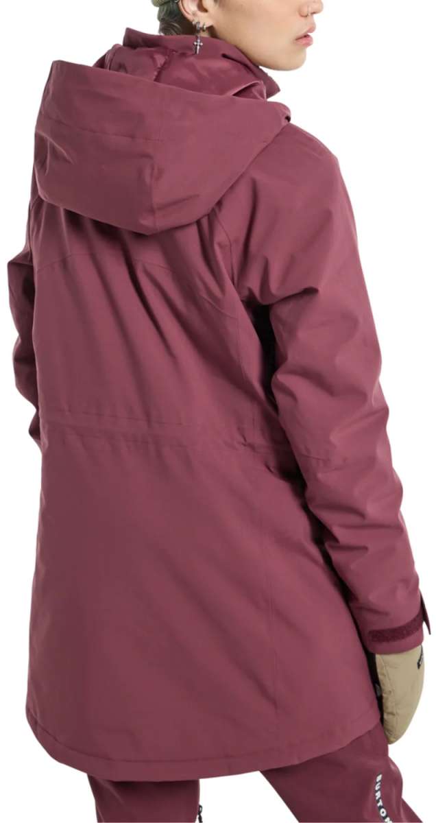 Burton Women's Prowess 2.0 2L Jacket 2024 - A woman wearing a maroon-colored jacket with a hood and silver zipper pull.