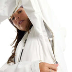 Burton Women's Pyne 2L Shell Jacket 2024 - A white jacket with a hood, featuring black zippers and a mesh material on the inside of the hood.