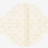 Burton Large Scraper Stomp Pad - A white stomp pad with a circular shape and rounded edges, featuring a textured surface with raised dots on both sides.