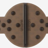 Burton Large Scraper Stomp Pad - A brown stomp pad with a rectangular shape and rounded corners, featuring a textured surface with raised dots on top.
