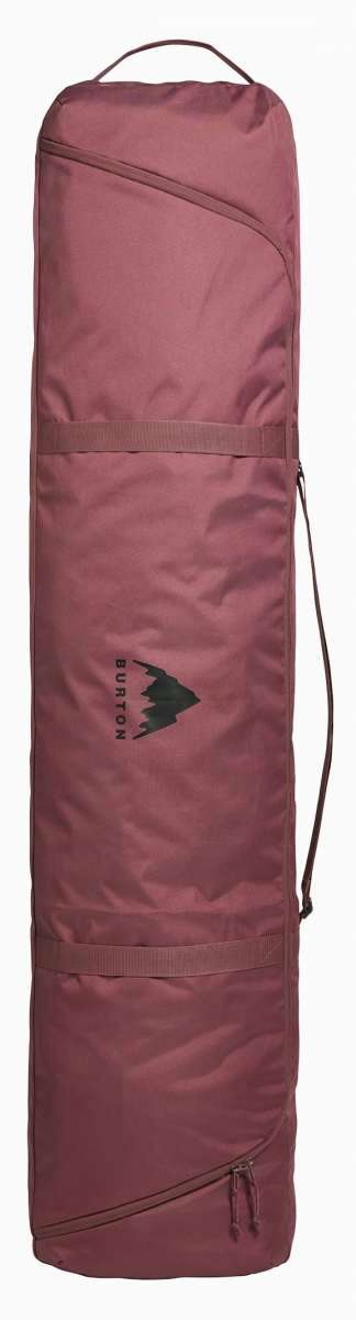Burton - Space Sack Board Bag 2024 is a dusty rose-colored bag with a zippered top and a handle at the top.