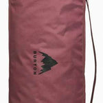 Burton - Space Sack Board Bag 2024 is a dusty rose-colored bag with a zippered top and a handle at the top.