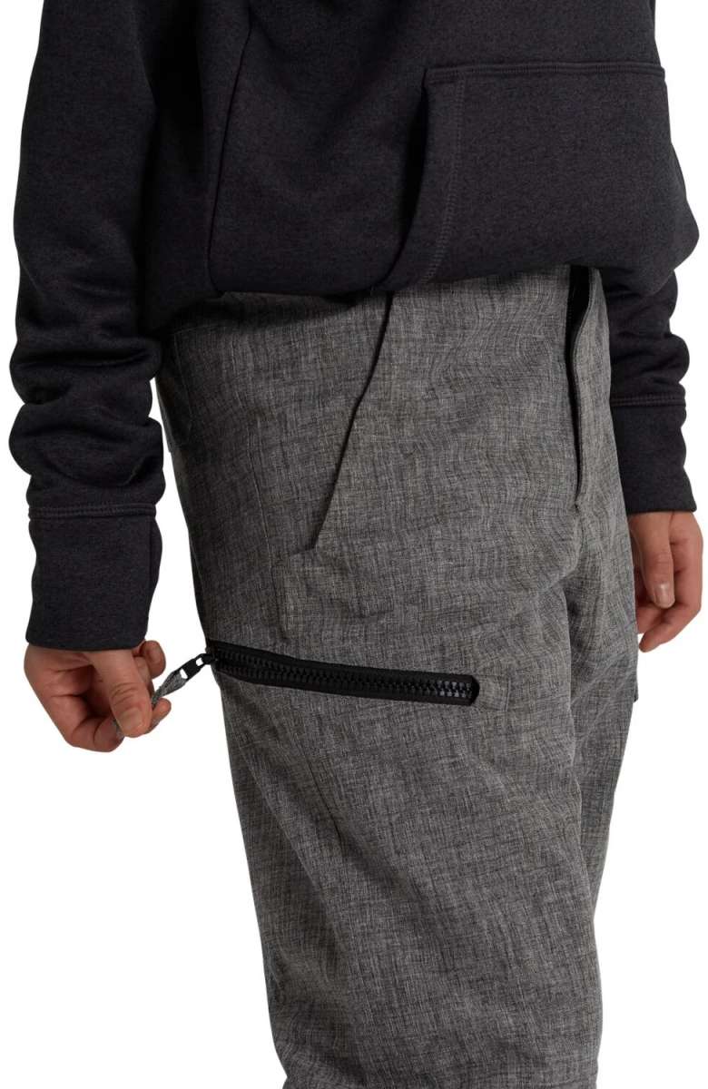 Burton Youth Exile 2L Insulated Cargo Pant 2024 - A pair of gray cargo pants with a zippered pocket on the thigh and a black zipper pull.