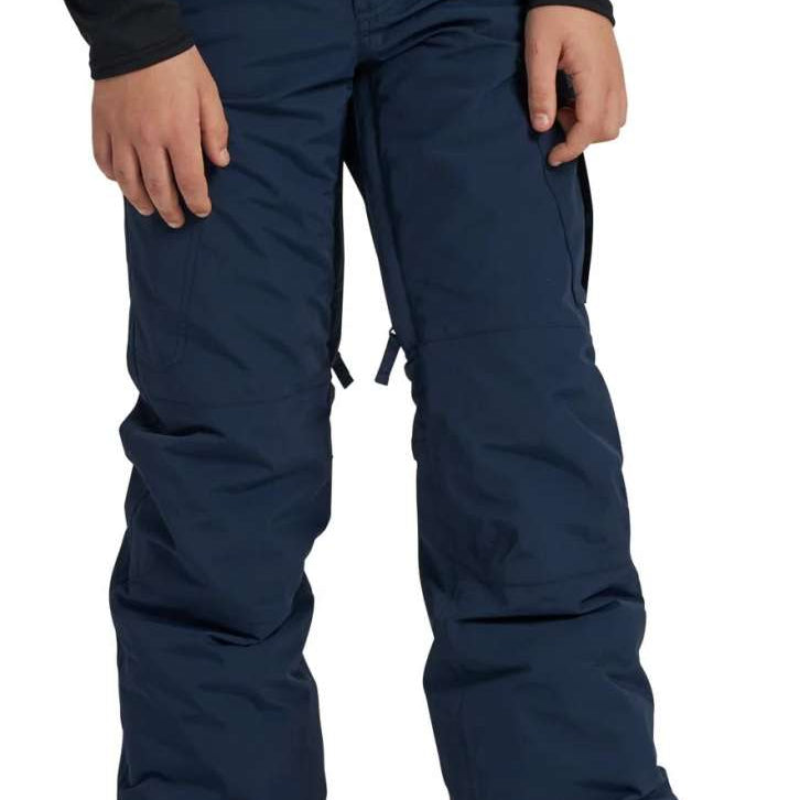 Burton Youth Exile 2L Insulated Cargo Pant 2024 - Dark blue snow pants with zippered cargo pockets on each thigh and adjustable Velcro straps at ankles.