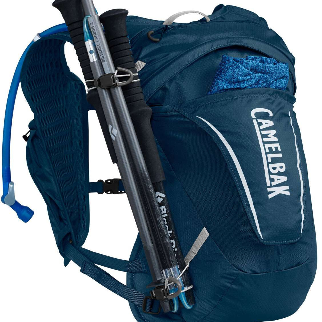 CamelBak Women's Octane 9 70 OZ Hydration Pack - A blue hydration pack with a white logo and straps, featuring a zippered pocket on the front.
