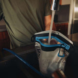 Camelbak Fusion 2L 70oz Reservoir - The reservoir is clear with a blue and black top.