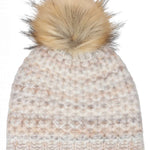 Chaos Ladies Laila Pom Beanie 2024 - A cream-colored beanie with a large, fluffy tan pom-pom on top.