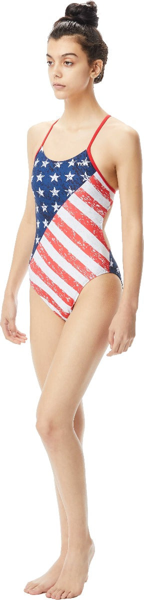 TYR Ladies' Star Spangled Cutoutfit Swimsuit - A red, white and blue swimsuit with a star pattern and cutouts on the sides.