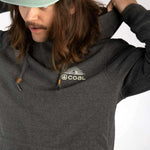 Coal Cultus Hoodie 2023 - A dark gray hoodie with a white logo on the left chest featuring a mountain and sun design.