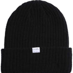 Coal Dan Mid Length Beanie 2023 - A black beanie with a white rectangular label featuring the word "COAL" in gray letters.