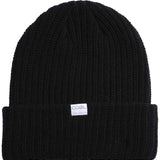 Coal Dan Mid Length Beanie 2023 - A black beanie with a white rectangular label featuring the word "COAL" in gray letters.