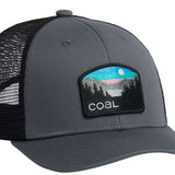 Coal Hauler Low One Cap 2024 - A dark gray cap with a black mesh back and a rectangular patch on the front featuring a mountain range under a blue sky, with trees in the foreground.