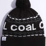 Coal Kelso Tall Pom Beanie 2023 - Black beanie with white lettering and a large black pom-pom on top.